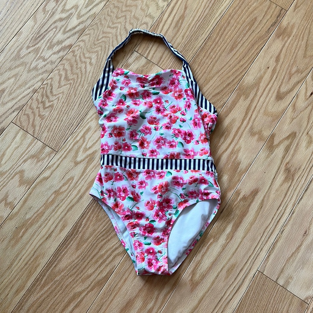 Tommy Bahama size 10 halter one piece swimsuit.  In good condition.